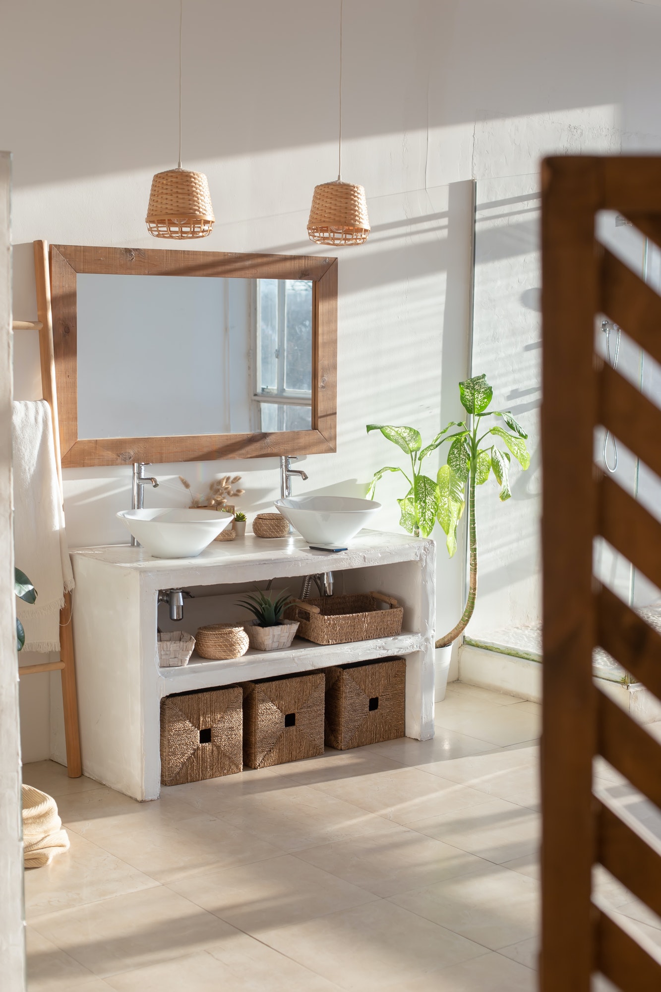 Stylish modern interior of a bright, sunny white bathroom