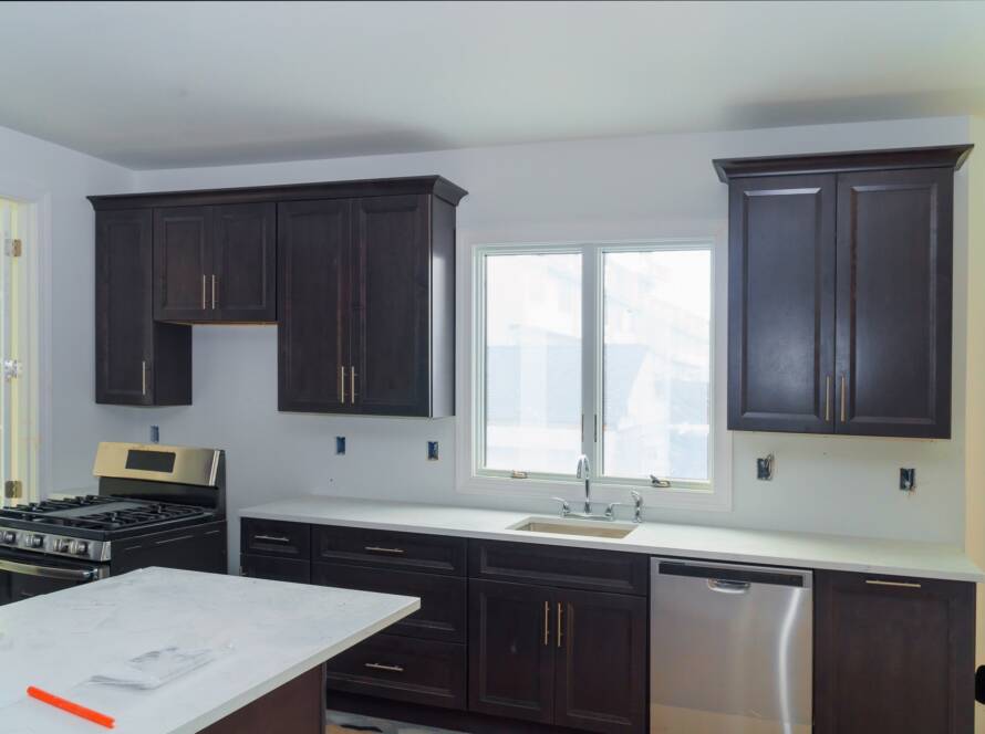 Home improvement kitchen remodel design construction of a kitchen with maple granite counter in home