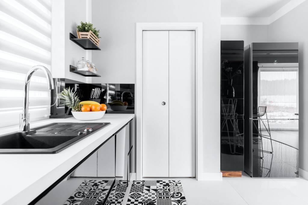 White kitchen with additions